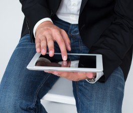 Man Using an iPad - Home Automation Software